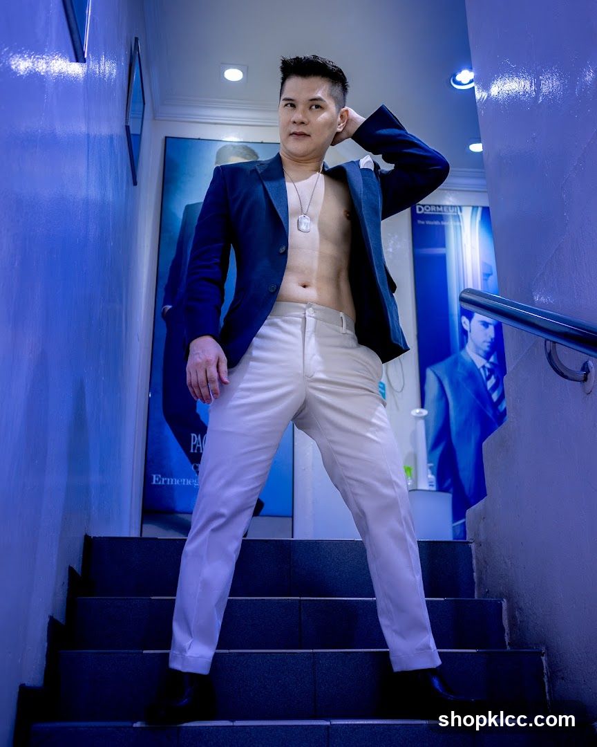 Man posing on stairs