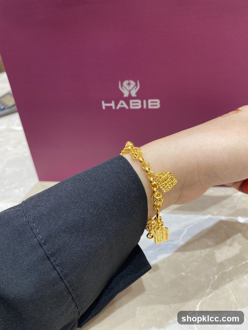 Gold Bracelet with Charms