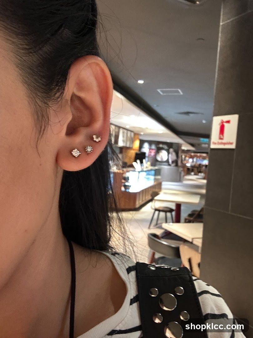 Woman with Earrings in Cafe