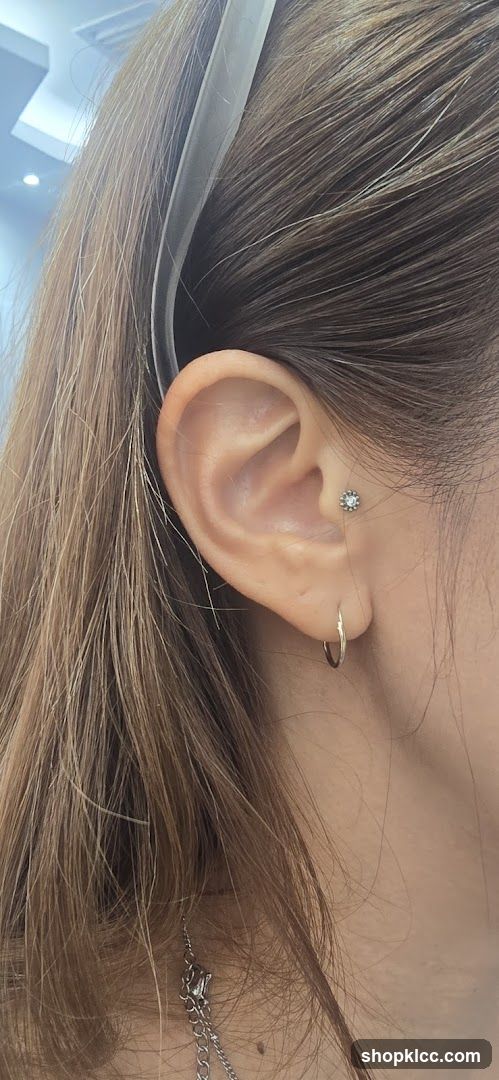 Close-up of a woman's ear with jewelry