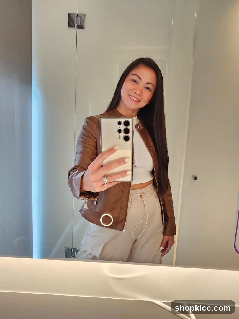 Woman taking a selfie in a mirror