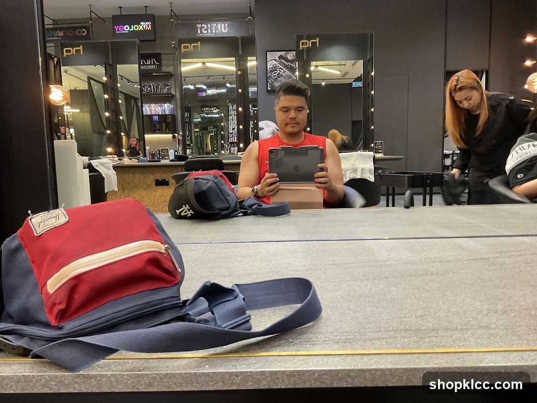Salon Interior with Man and Stylist