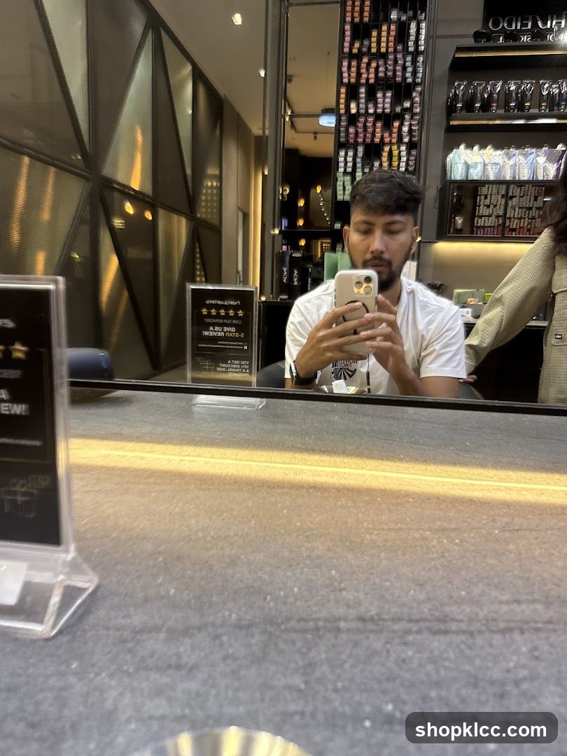Man taking a selfie in a salon