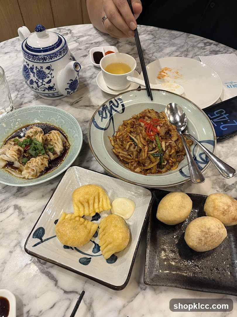 Table with various Asian dishes