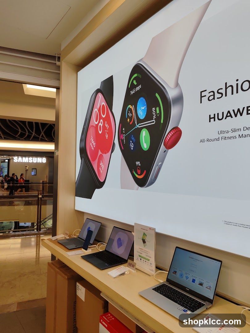Huawei Smartwatch and Laptop Display