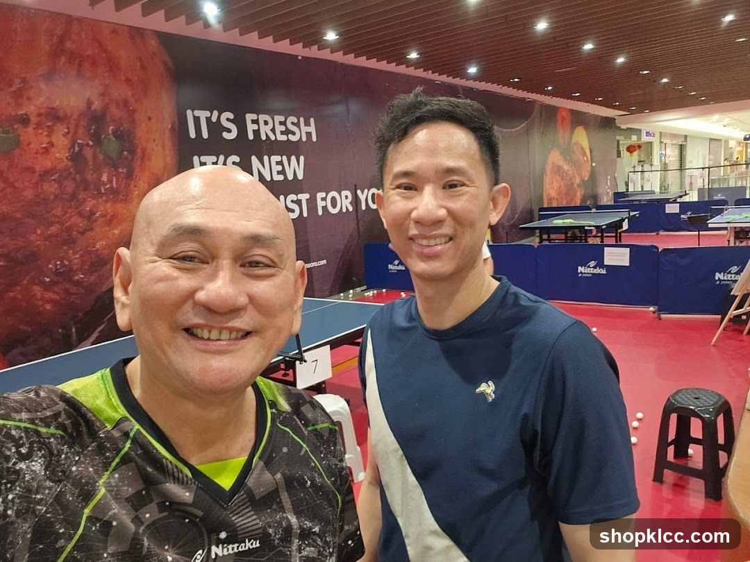 Two Men at a Table Tennis Venue