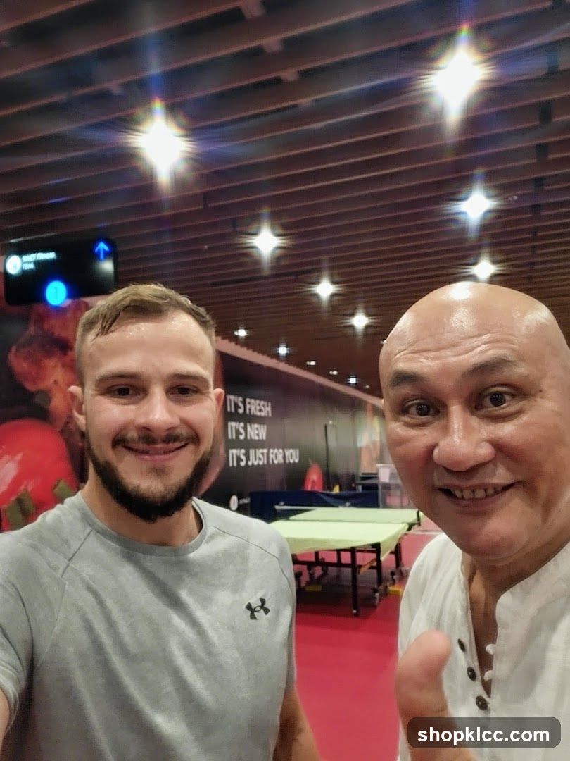 Two men smiling for a selfie