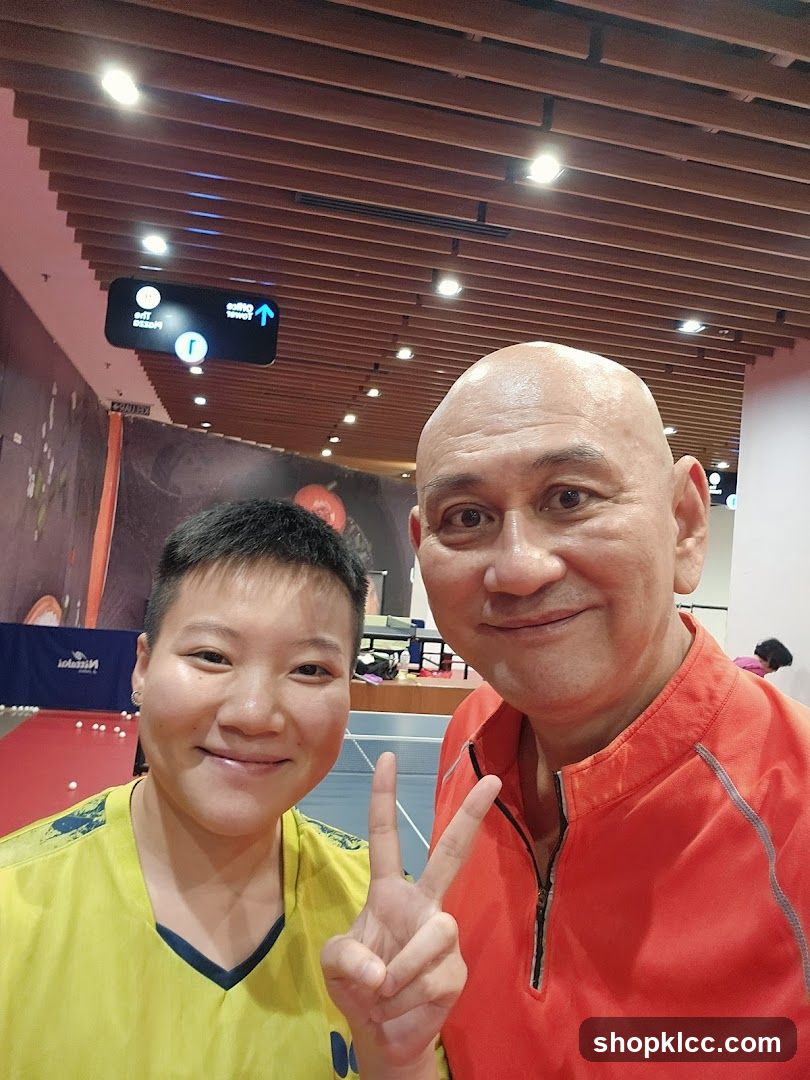 Two people posing for a photo