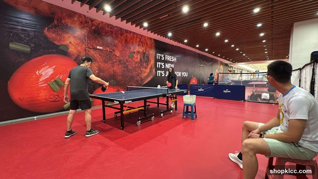 People playing table tennis