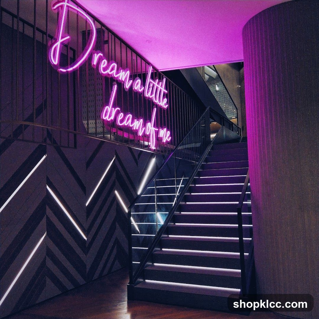 Neon Sign Above Staircase