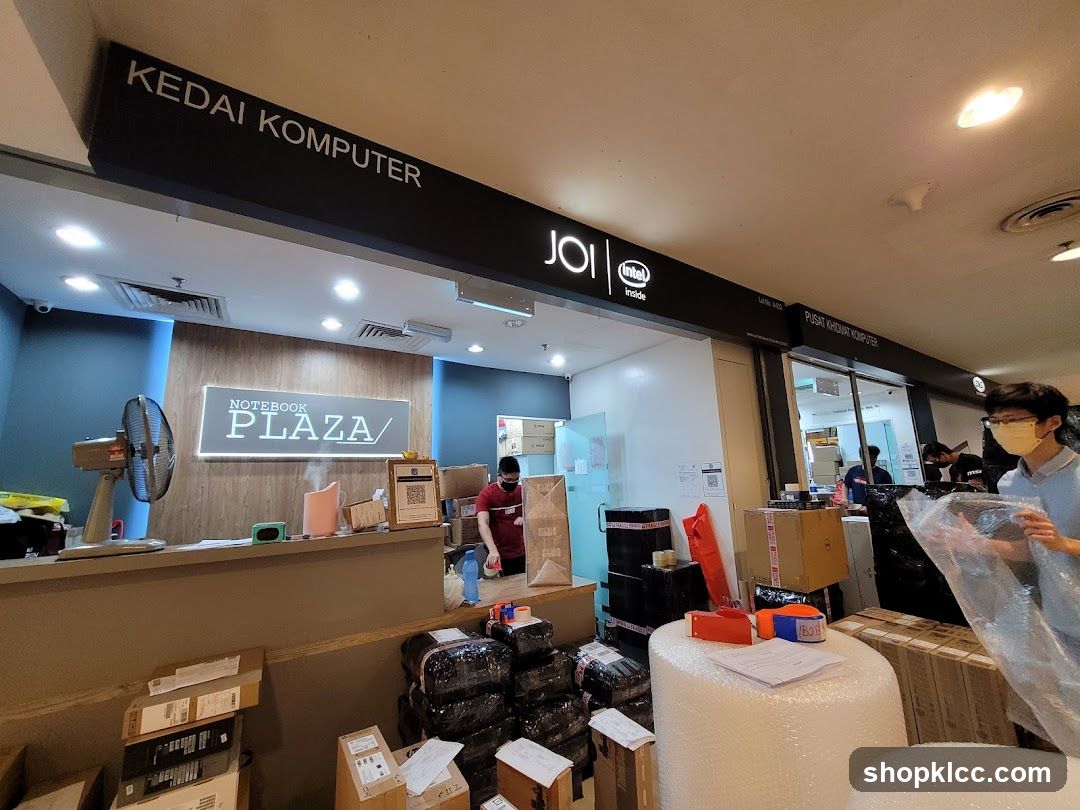Computer store interior with merchandise