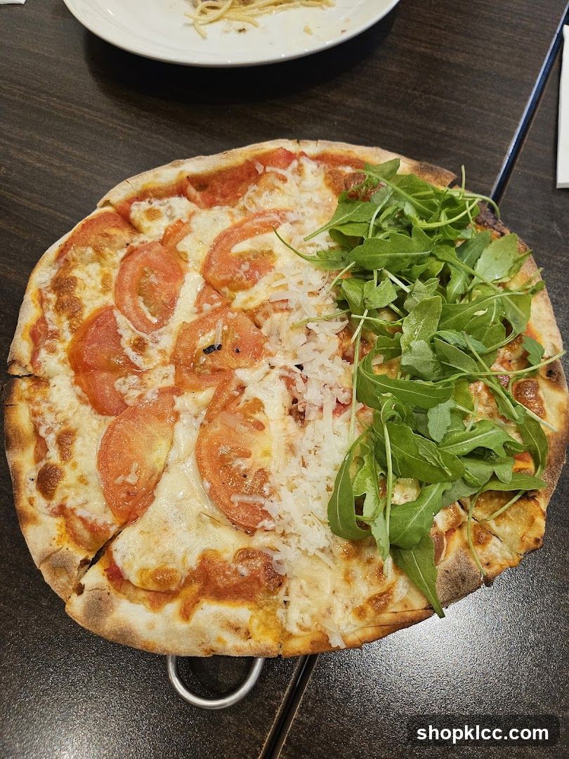Pizza with Tomatoes and Arugula