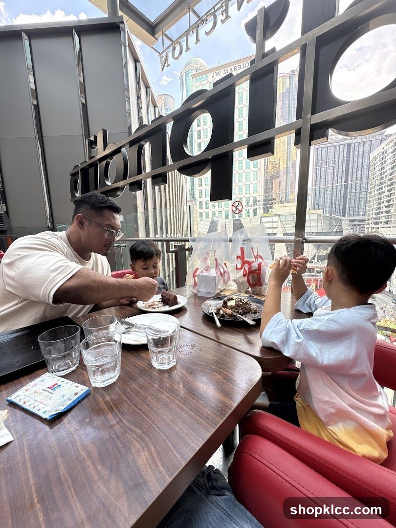 Family enjoying dessert at a restaurant