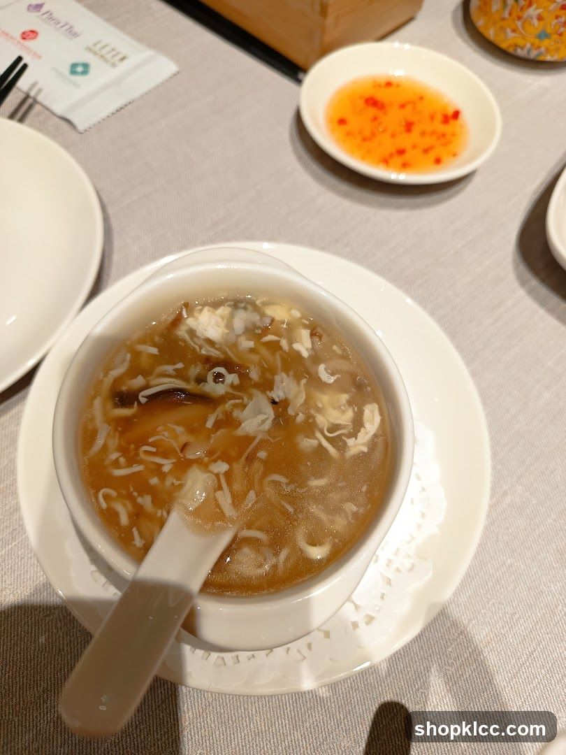 Soup with Spoon and Dipping Sauce
