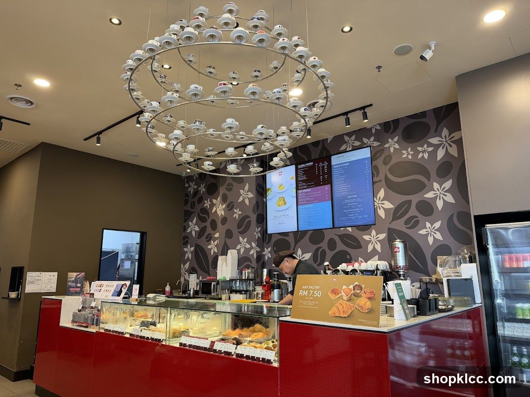 Cafe Interior with Pastries and Menu Boards