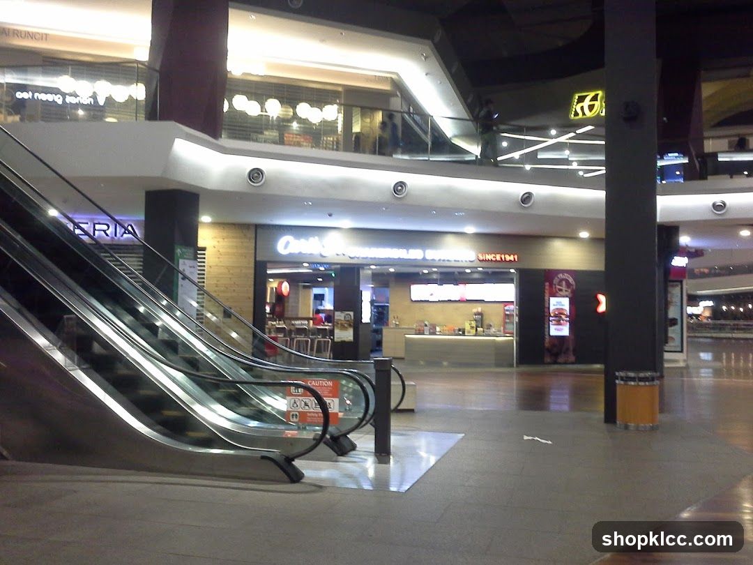 Mall Interior with Escalators and Food Court