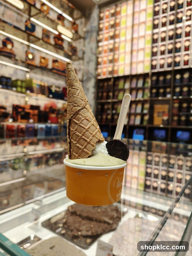 Gelato in a cup with a cone