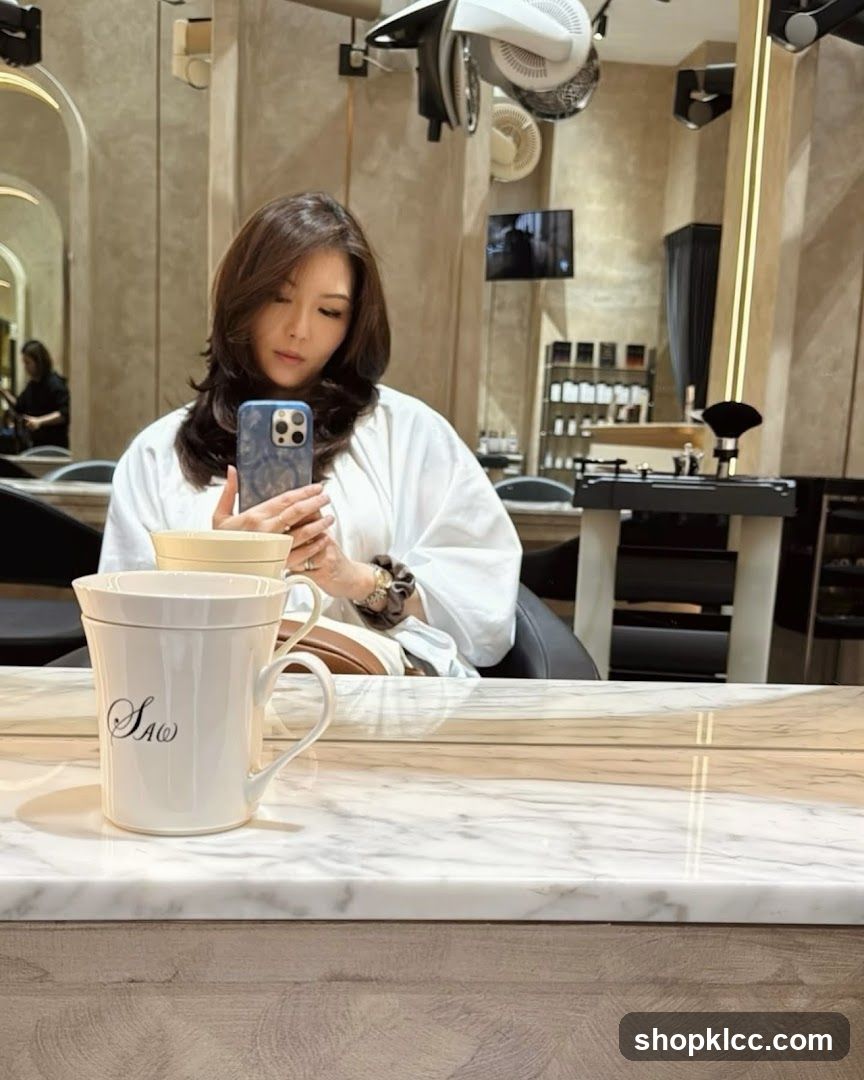 Woman taking a selfie in a salon