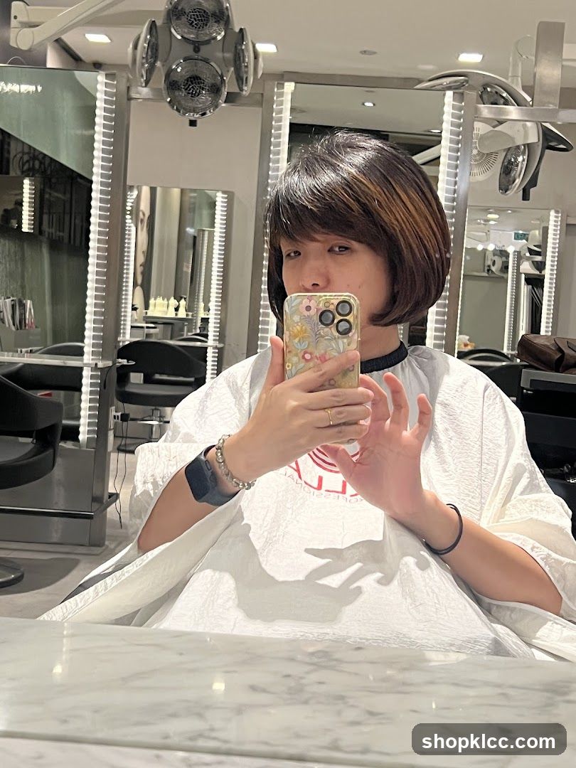 Woman taking a selfie in a salon