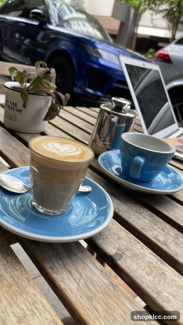 Coffee and Laptop on Outdoor Table