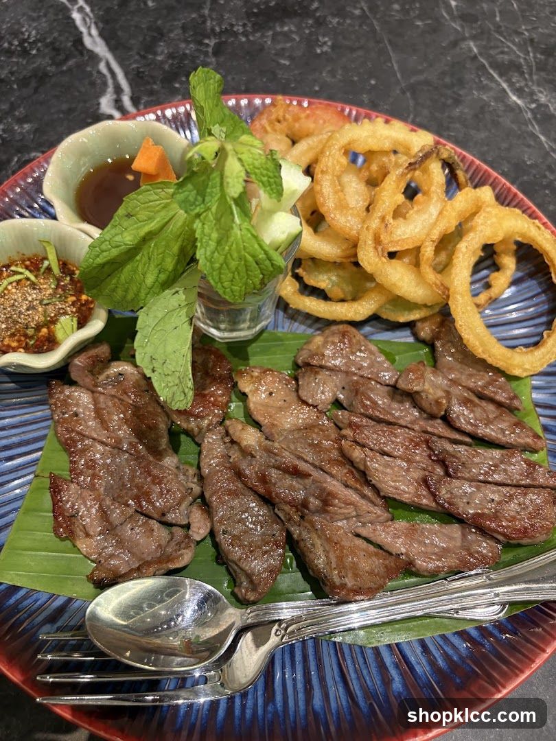 Grilled Beef with Onion Rings and Dipping Sauces