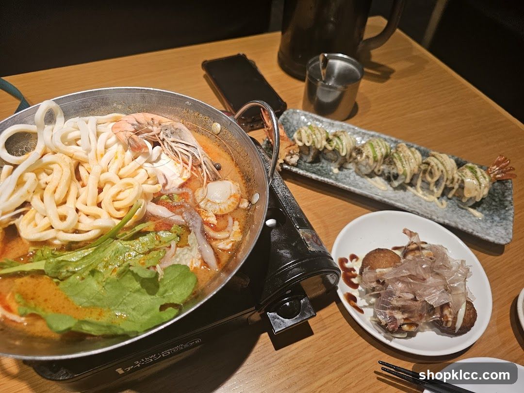 Seafood Noodle Soup, Sushi Rolls, and Takoyaki