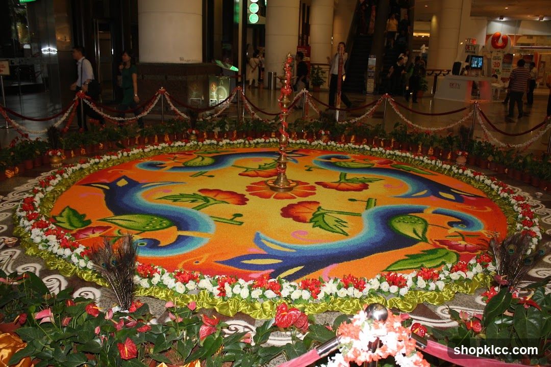 Rangoli decoration with peacocks and flowers