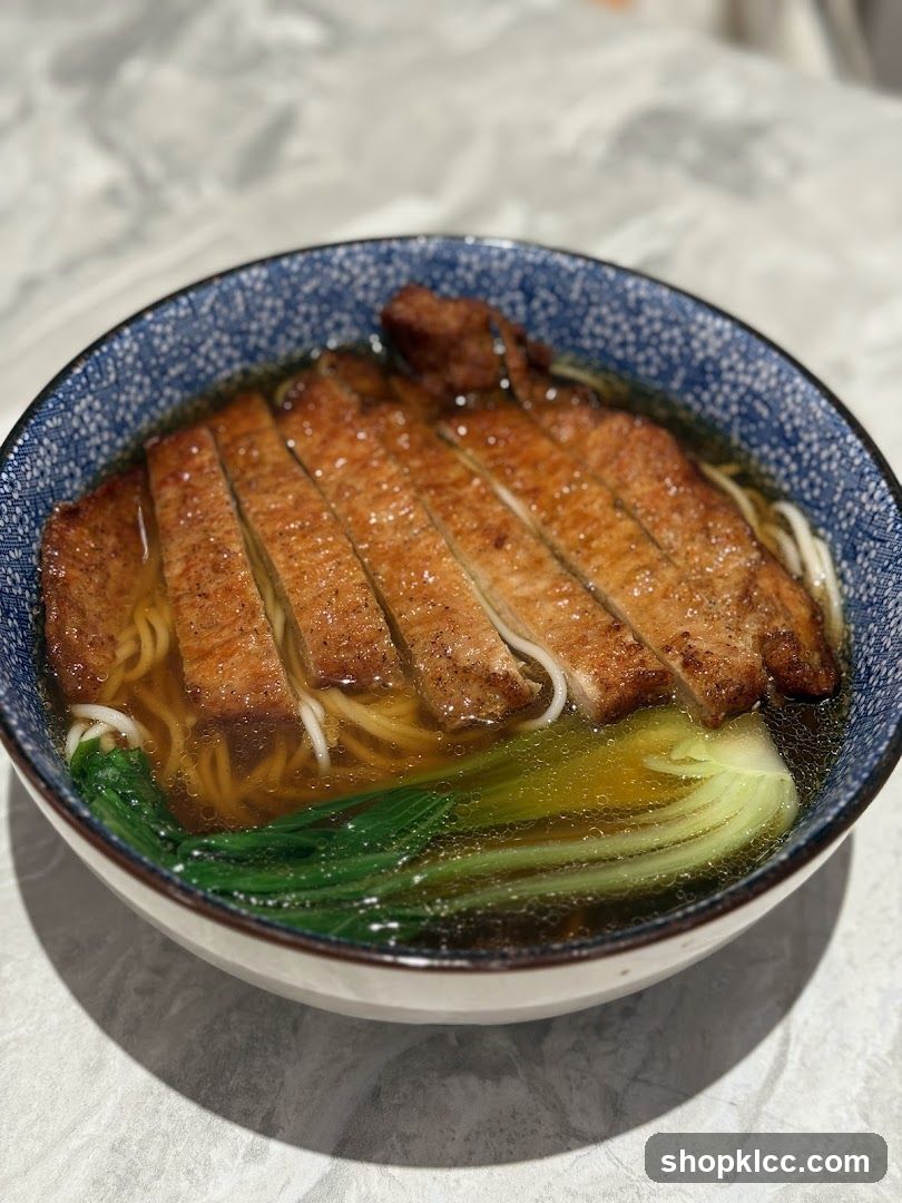 Noodle Soup with Sliced Meat and Greens