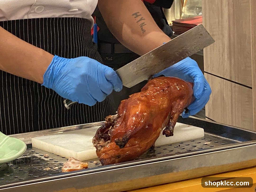 Chef Carving Roasted Duck