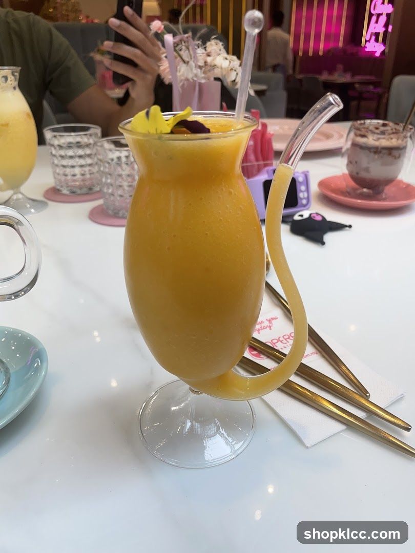 Orange Smoothie with Edible Flowers