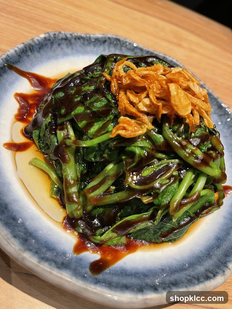 Vegetable Dish with Sauce and Crispy Onions