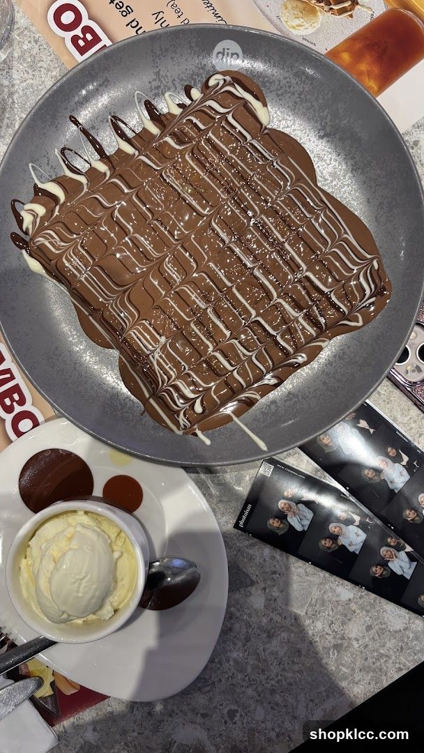 Dessert with Chocolate Drizzle and Ice Cream