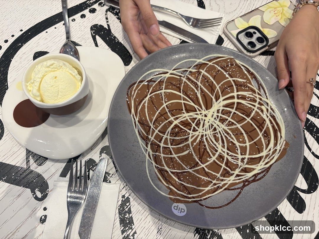 Dessert with Chocolate Drizzle and Ice Cream