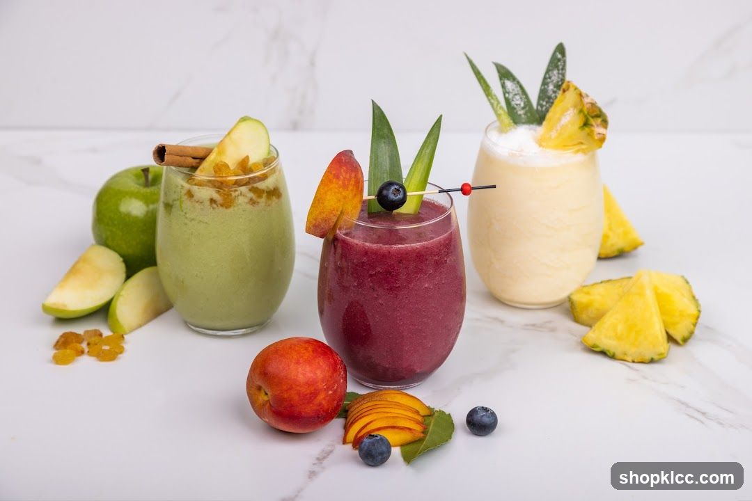Three Smoothies with Fruit Garnishes