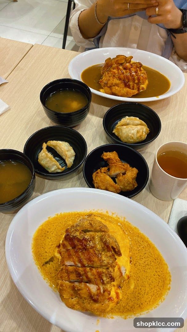 Japanese Curry Rice with Fried Chicken and Gyoza