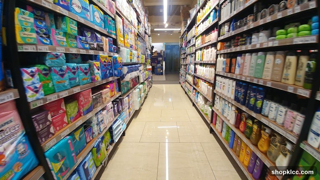 Aisle in a store with shelves stocked with hygiene products and toiletries.