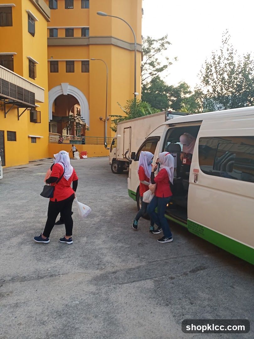 People boarding a van