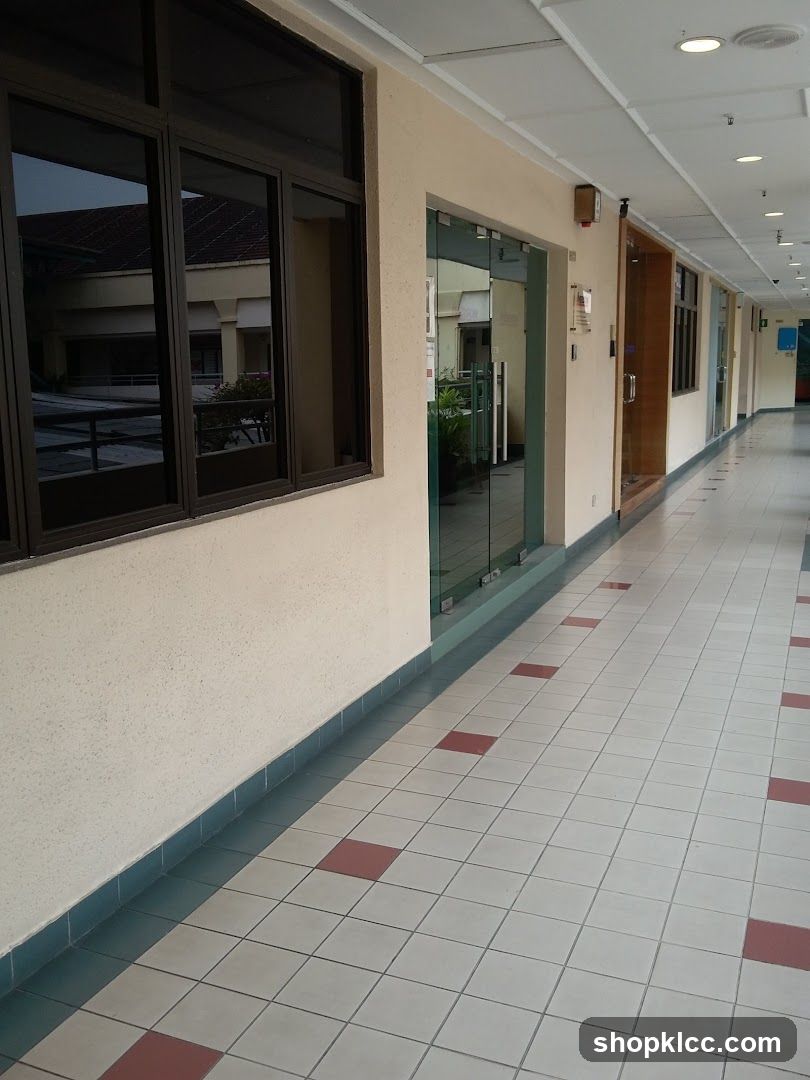 Empty Corridor with Glass Doors and Windows