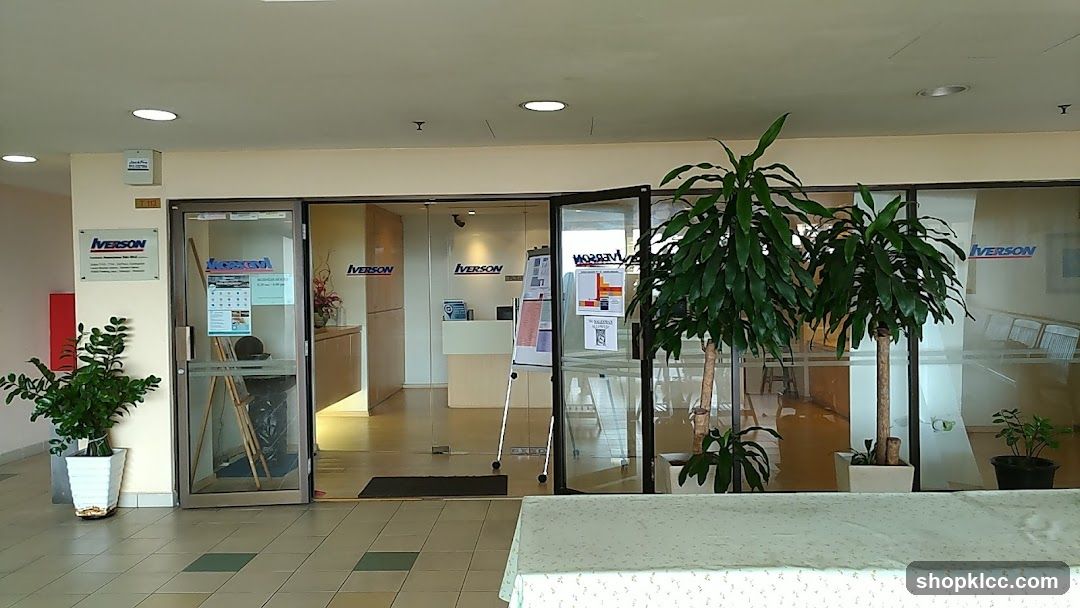 Office Entrance with Plants and Signage