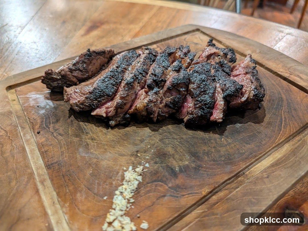 Sliced Steak on Wooden Board