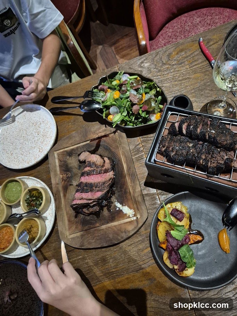 Dinner spread with steak and salad