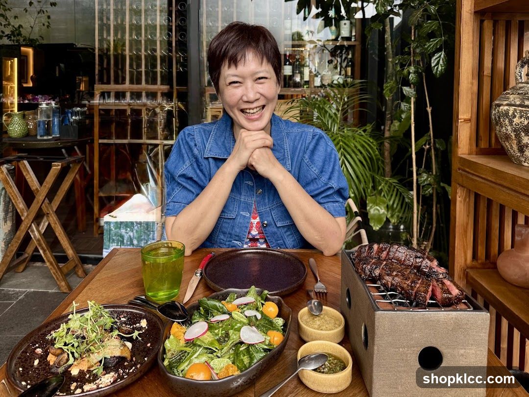 Woman enjoying a meal at a restaurant