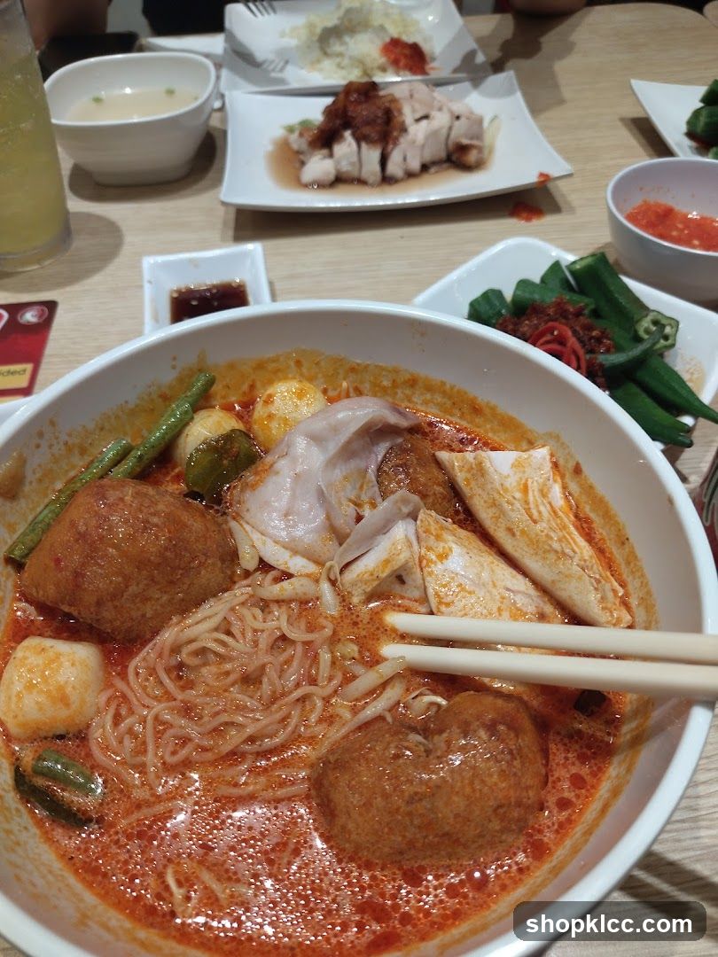 Curry Laksa with Chicken Rice