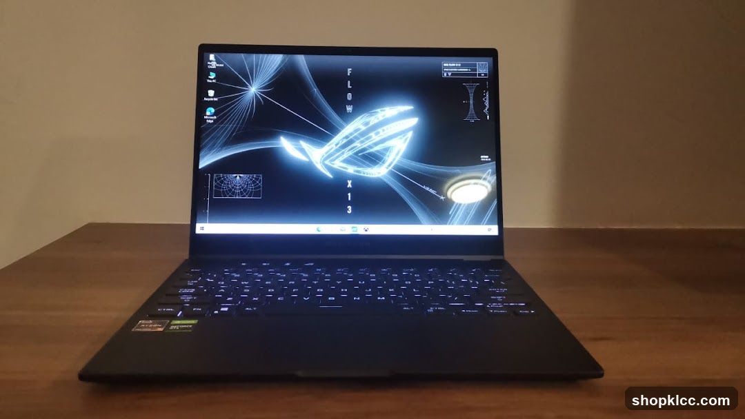 Laptop with ROG wallpaper