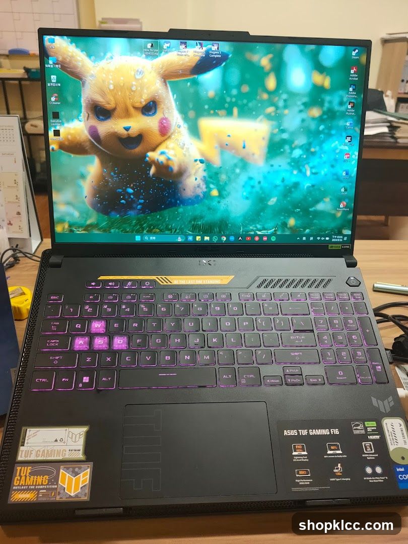 Laptop with Pikachu Wallpaper