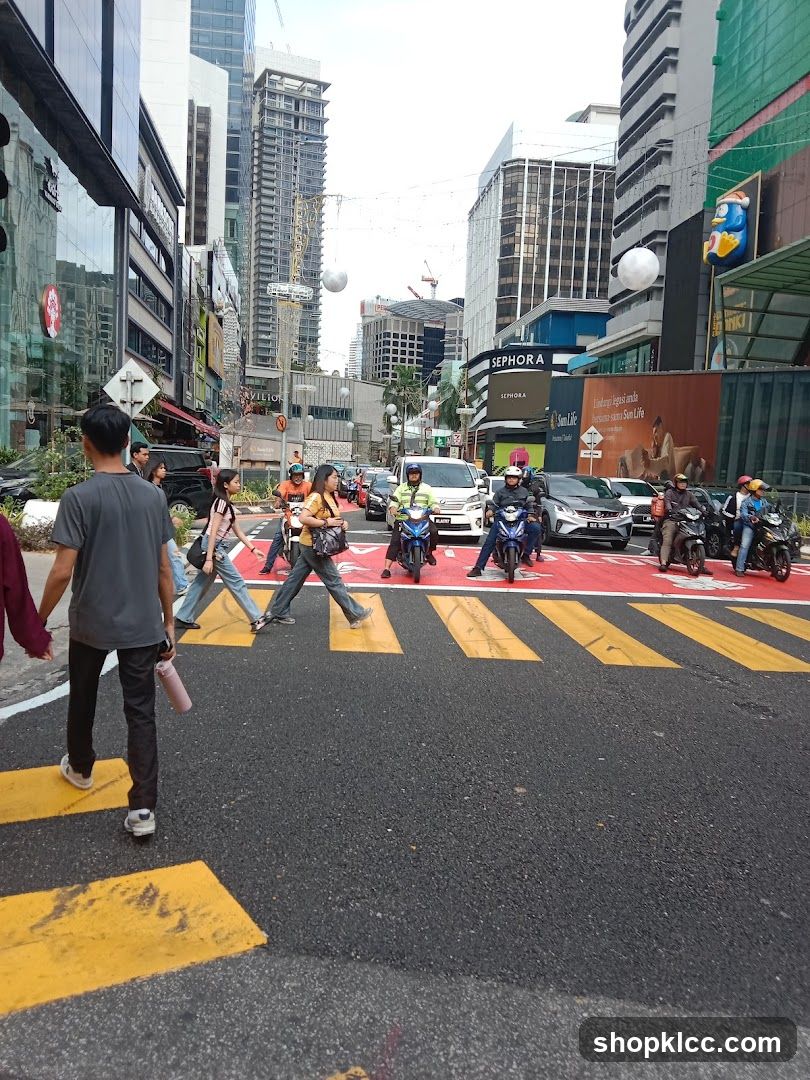 Busy City Street with Pedestrians and Traffic