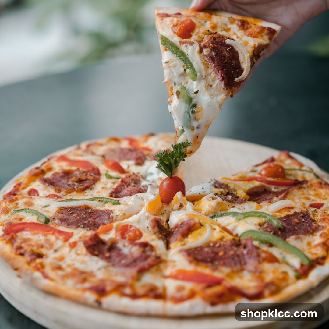 Pizza Slice Being Lifted