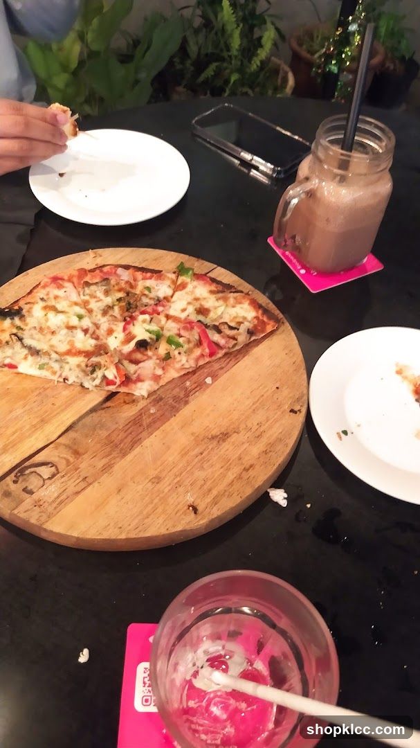 Pizza and Drinks on a Table