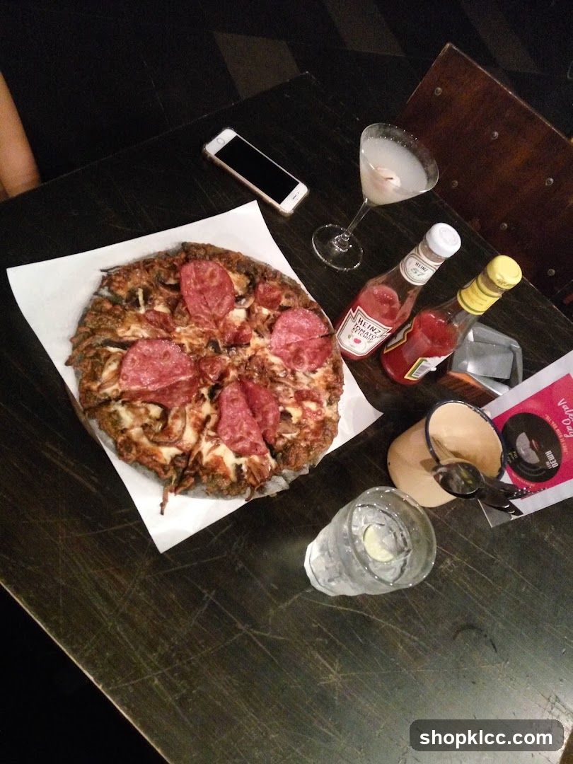 Pizza and Drinks on Table