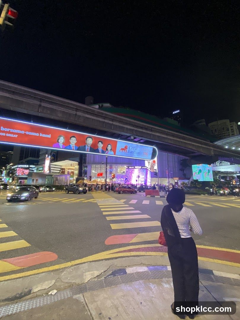 Nighttime City Street with Advertisements